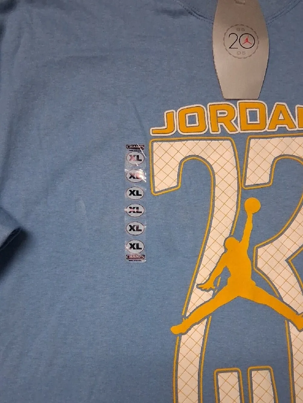 Jordan Men’s Light Blue Short Sleeve Tee with Yellow Graphic